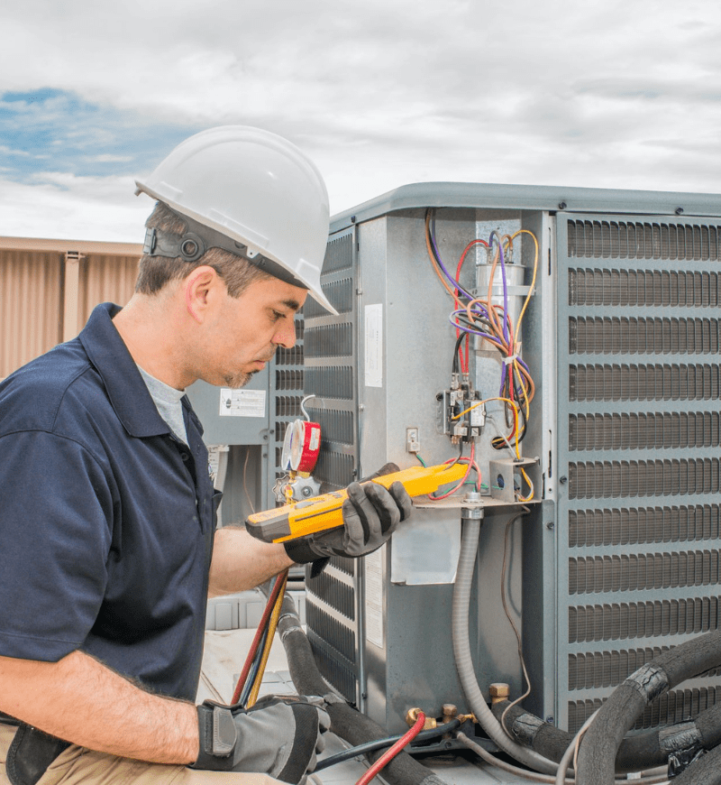 Close-up of an HVAC control panel with labeled components.